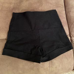 Tight black mini shorts